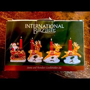Vintage international Bizaar Santa and reindeer candle holder set